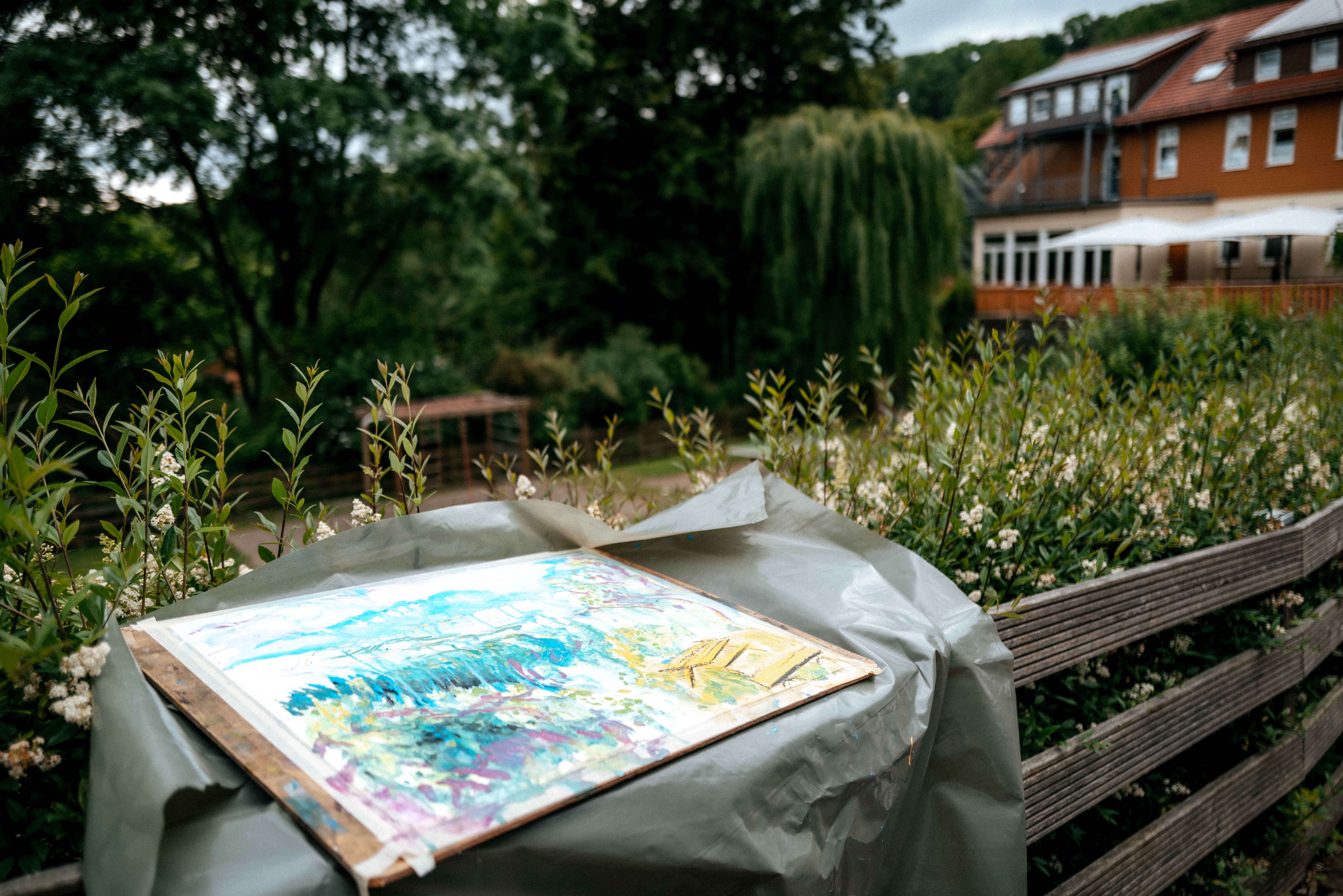 Painted landscape from the workshop in front of the real scenery