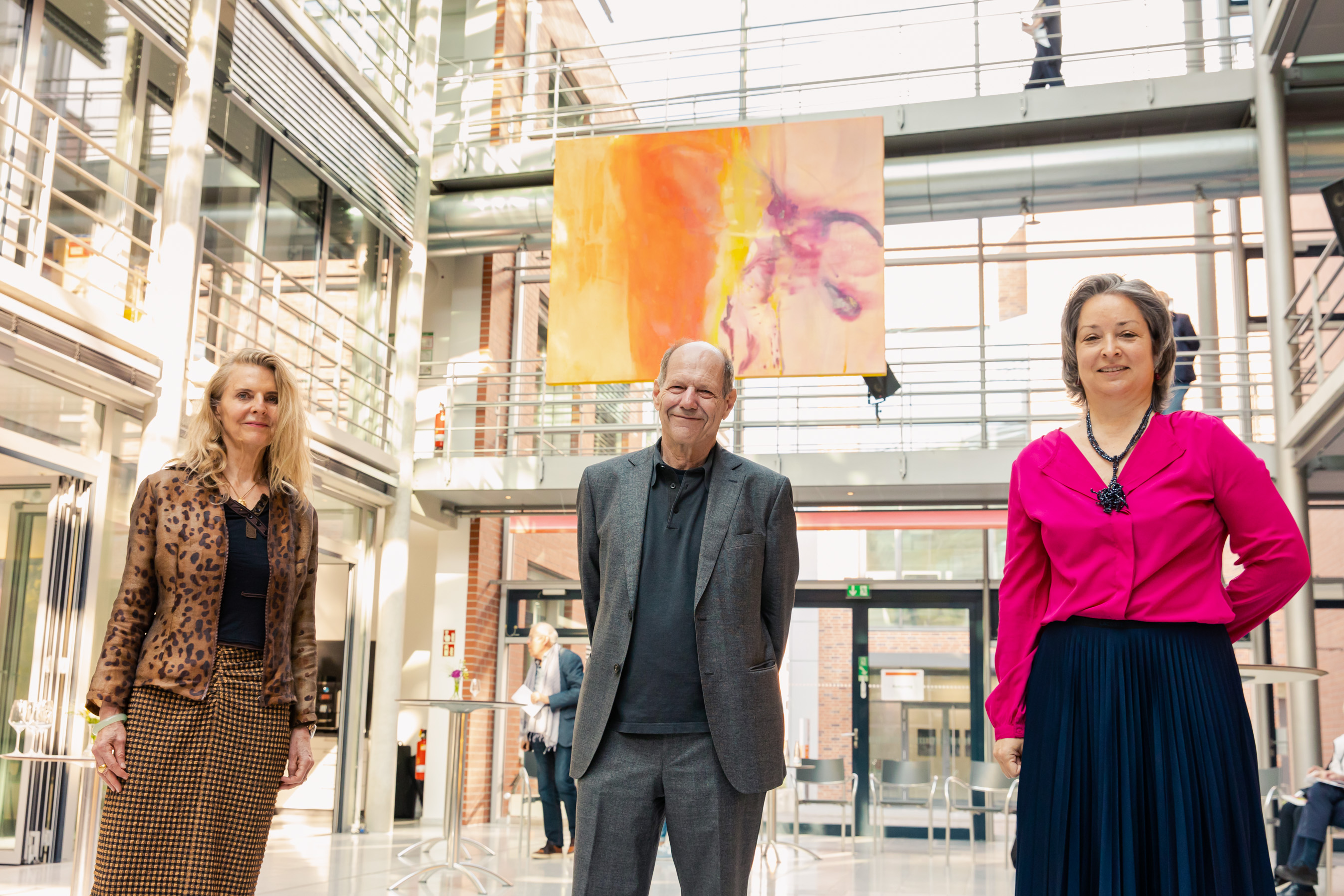 Picture of the Opening of the Exhibition of Petra Lemmerz with the artist herself, Michael Stoeber, art historian, and Eva Kienle standing in the Biotechnikum in Einbeck