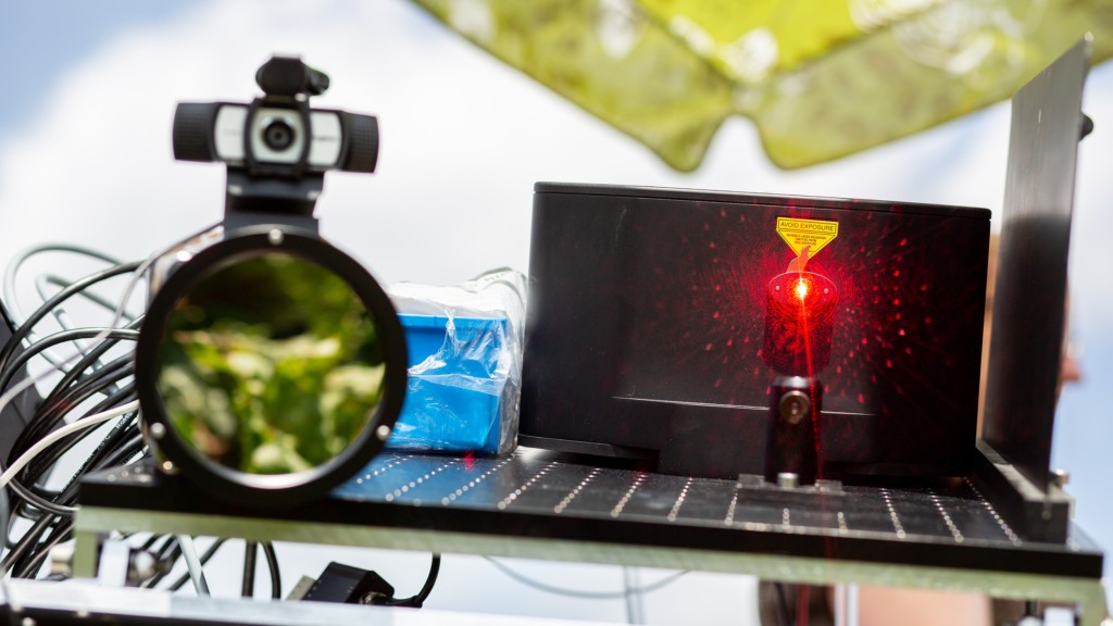 Close-up of a thermal imaging camera and a laser beam directed at an experimental field with sugar beets infested by the fungus Cercospora in Plattling (Bavaria).