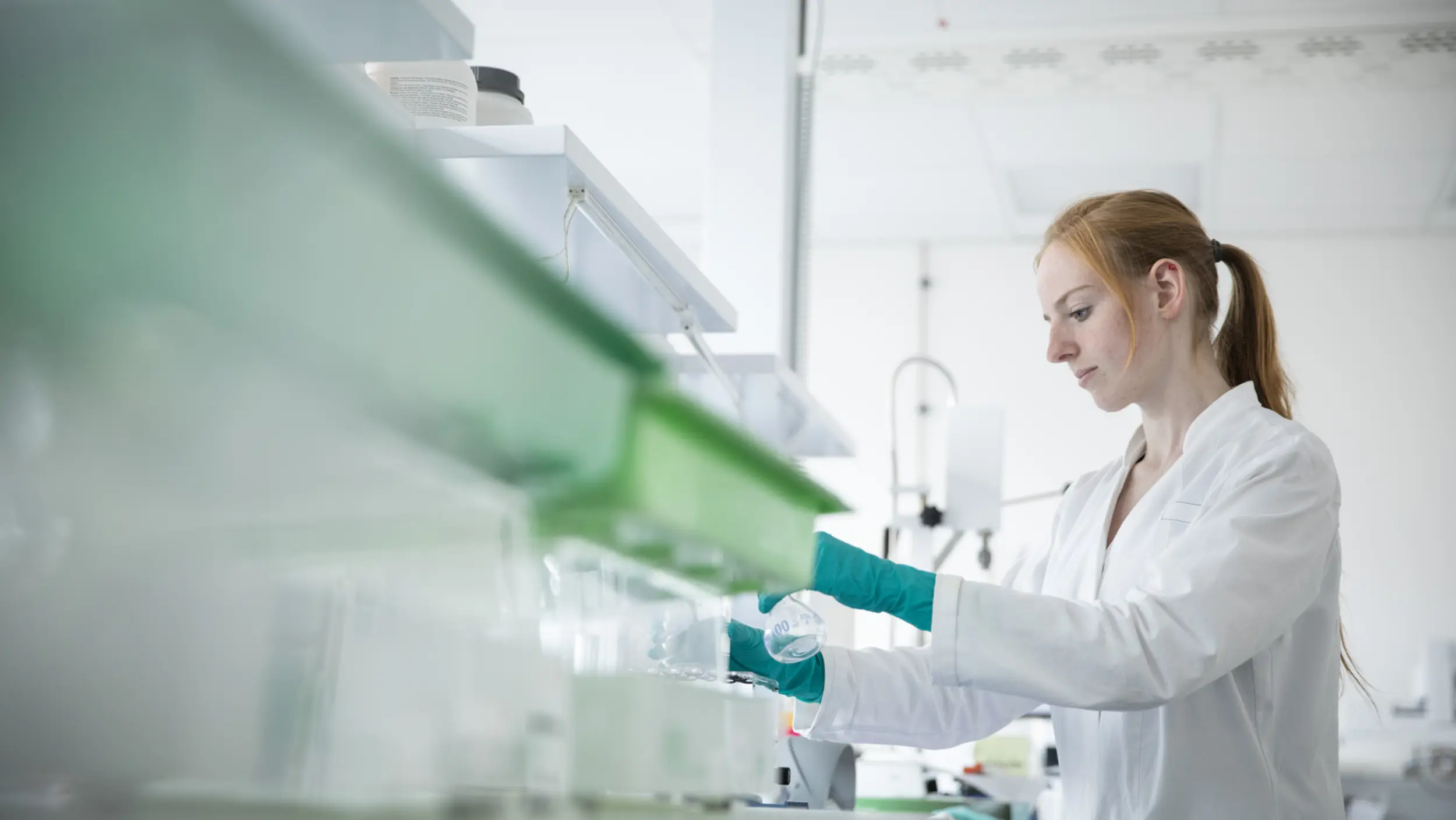 KWS employee working in a lab