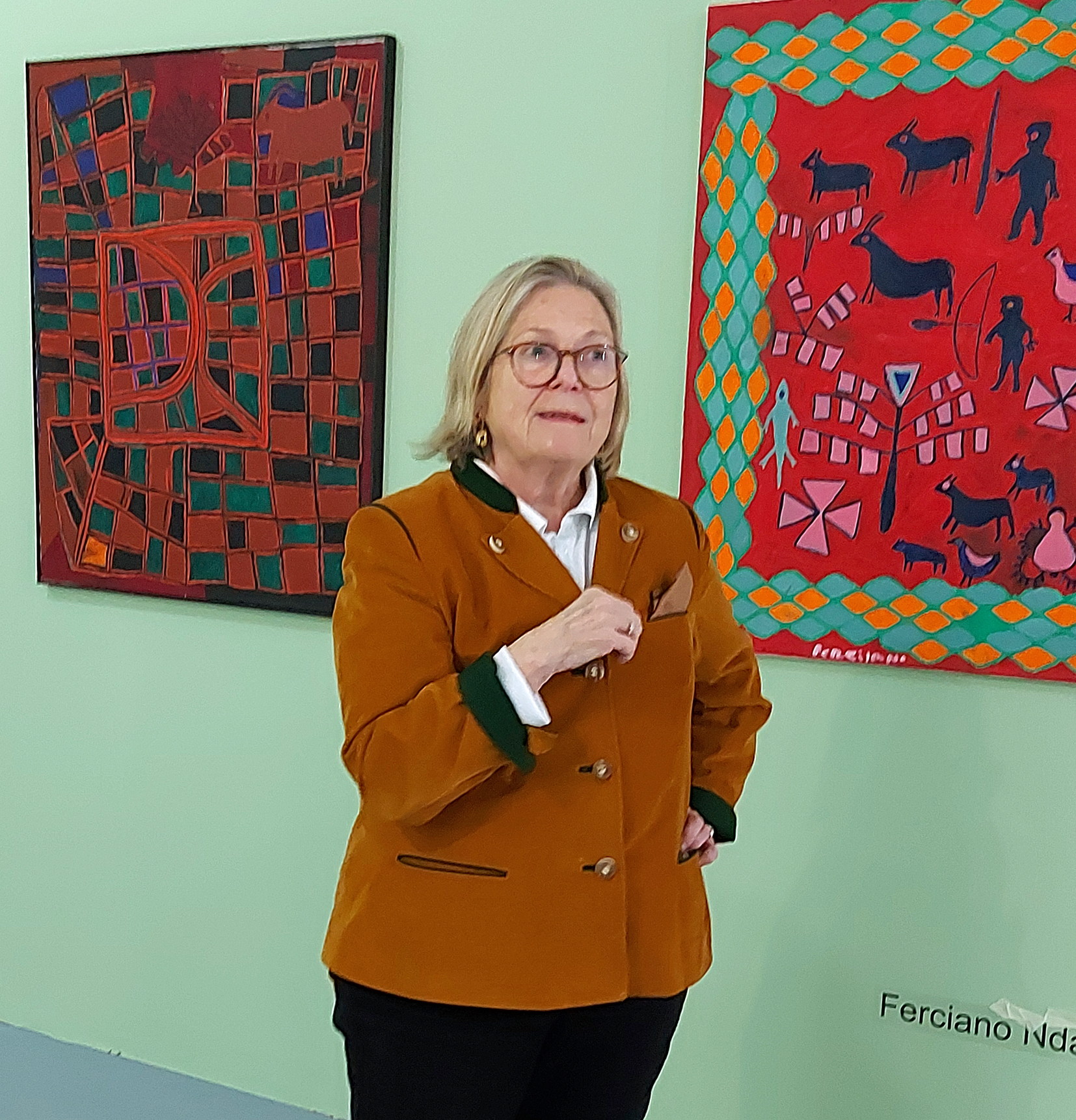 Hella Rabbethge-Schiller standing in front of her collection